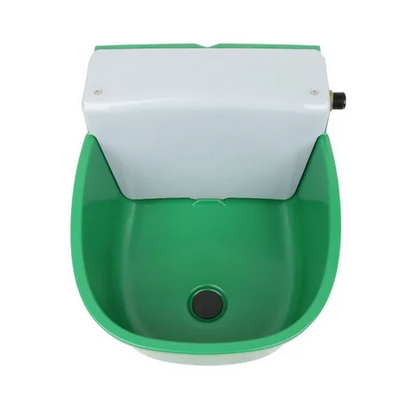 Grünes Kunststoffbecken mit weissem Gehäuseoberteil, seitlichem Anschlussgewinde und zentralem Bodenablauf.