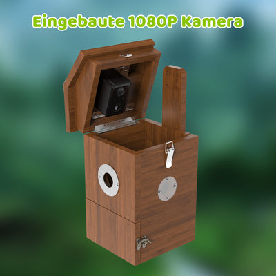 Holzbox mit geöffnetem Deckel, eingebauter 1080P Kamera im Innenraum, seitliche runde Öffnung mit Metallring und Frontverschluss, unscharfer grüner Hintergrund.