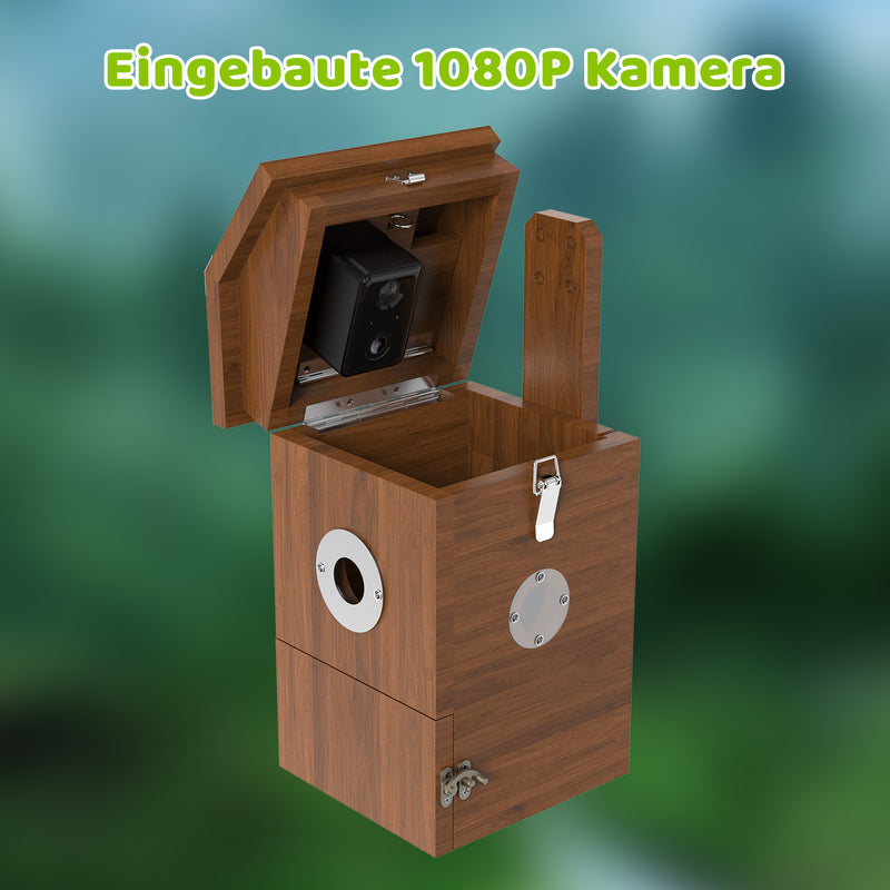 Holzbox mit geöffnetem Deckel, eingebauter 1080P Kamera im Innenraum, seitliche runde Öffnung mit Metallring und Frontverschluss, unscharfer grüner Hintergrund.