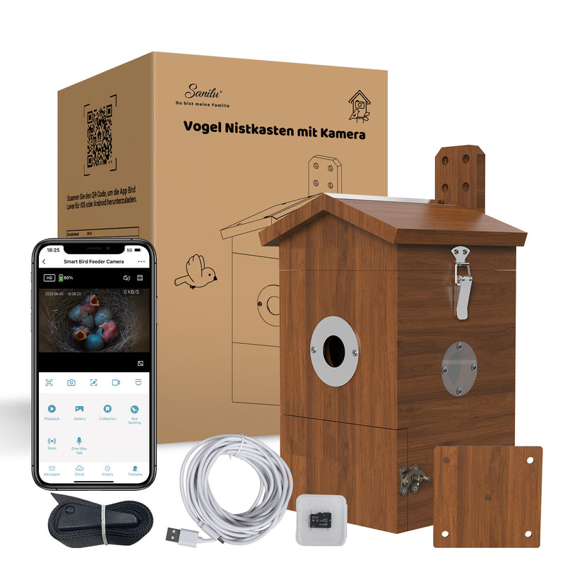 Holz-Vogelhaus-Nistkasten mit Kamera, inkl. Montageset, Kabel, Netzteil und Zubehör; Verpackung zeigt „Vogel Nistkasten mit Kamera“ und Smartphone-App-Ansicht.